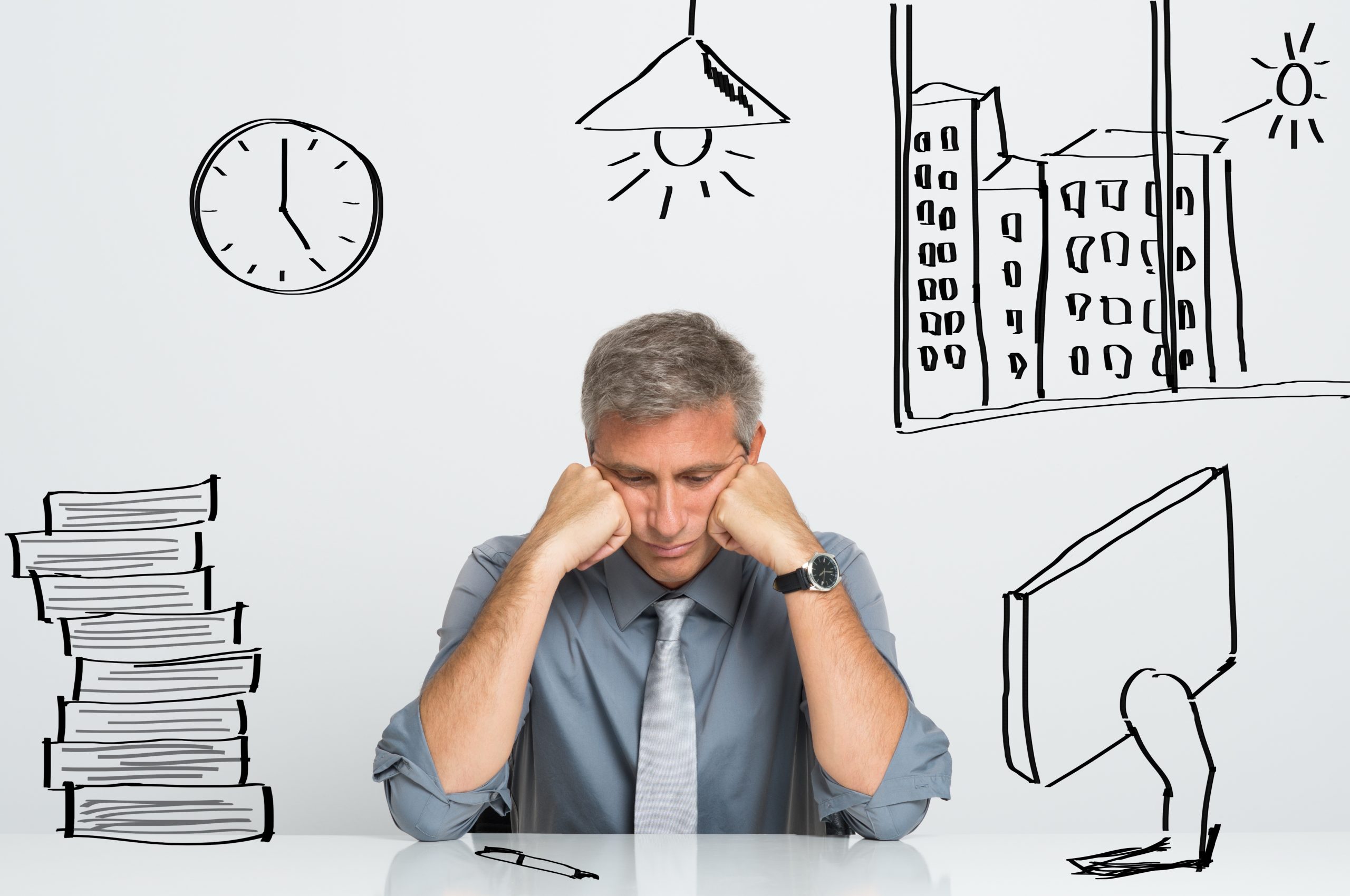 Un homme qui est stressé au travail